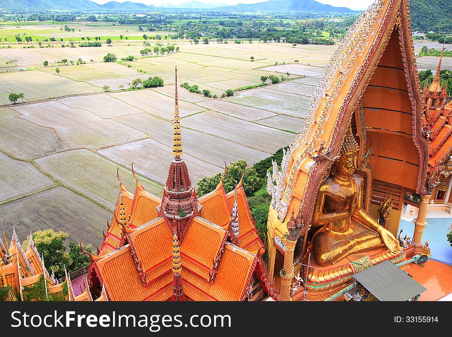 Big Buddha statue at Wat thum saue, Kanchanaburi, Thailand in top view. Big Buddha statue at Wat thum saue, Kanchanaburi, Thailand in top view