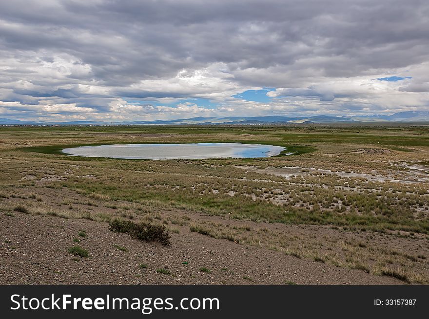 lake steppe mountains sky