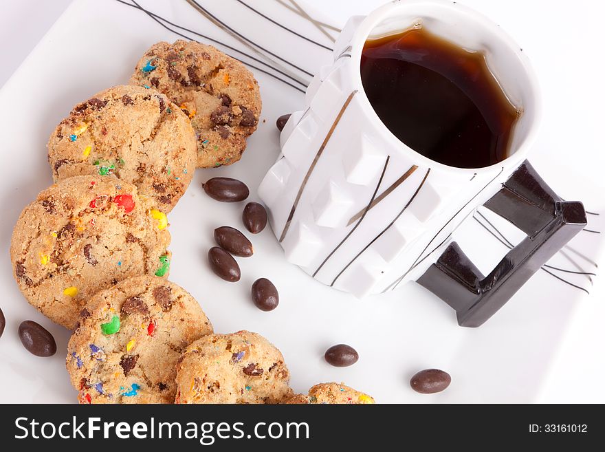 Cookies and chocolate with tea