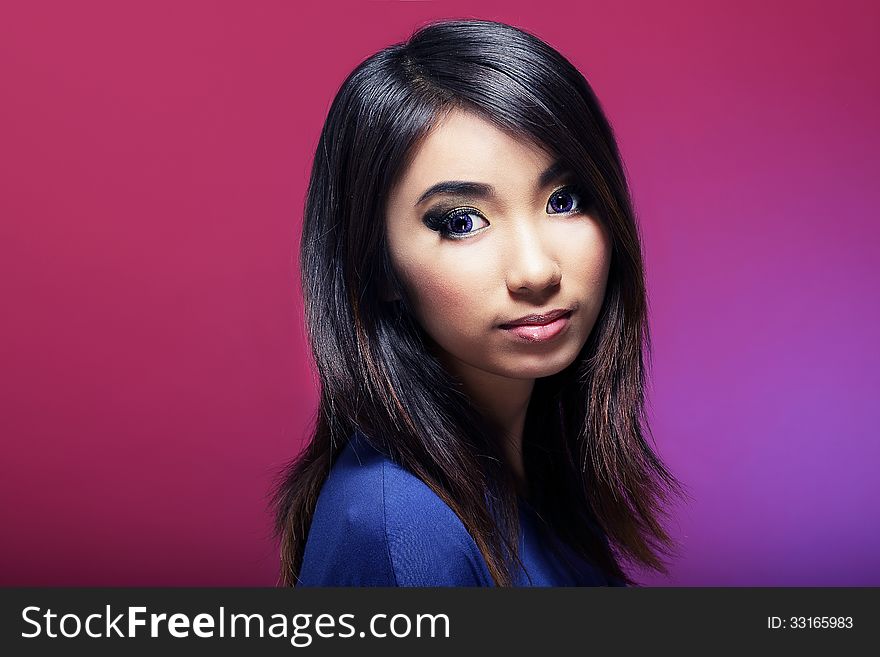 Brown Hair Young Woman Over Colorful Background