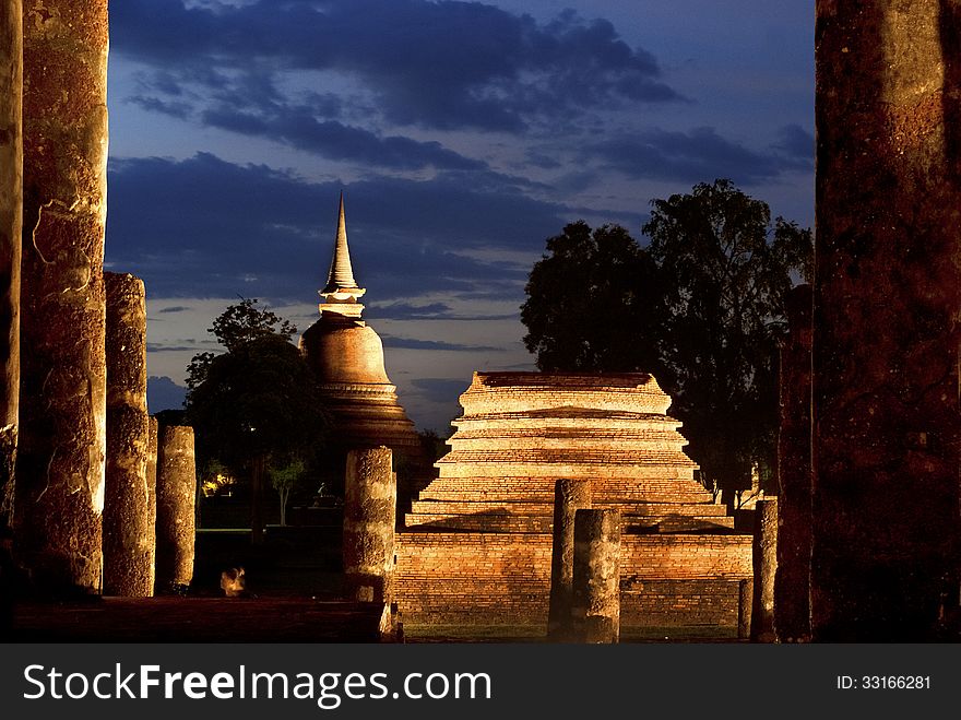 Illuminated prang at Wat Chana Songkram in Sukhothai province, Thailand. Illuminated prang at Wat Chana Songkram in Sukhothai province, Thailand