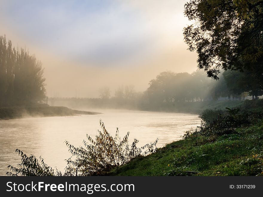 Fog in autumn on the river