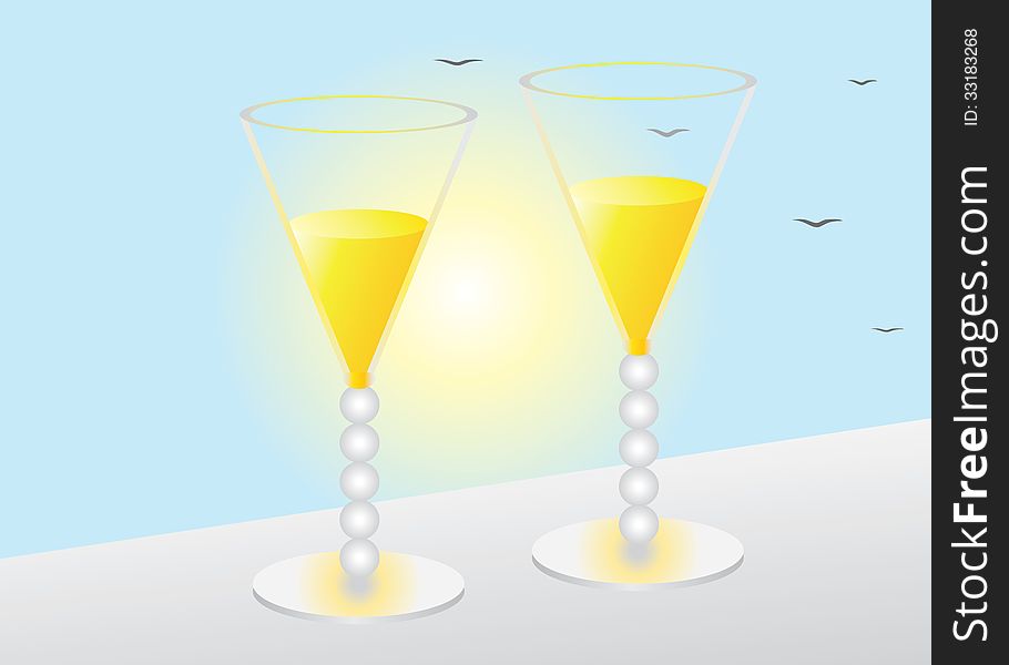 Two glasses. Two glasses of juice on the terrace view of the sky, the sun and birds.