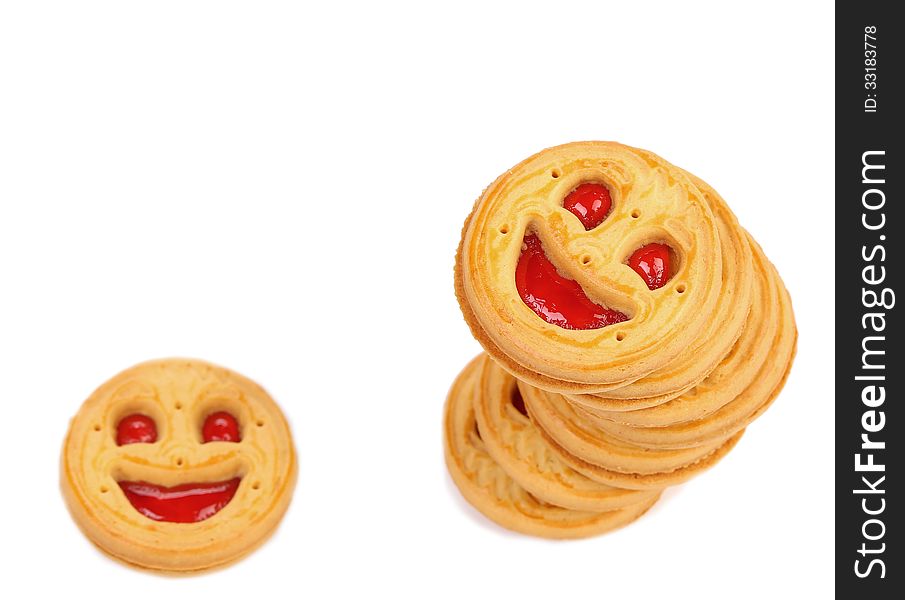 Stack of smile biscuits. Close up. White background.