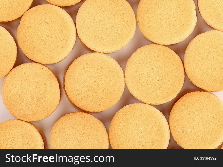 Honeycomb of biscuit sandwich with white filling. Background.