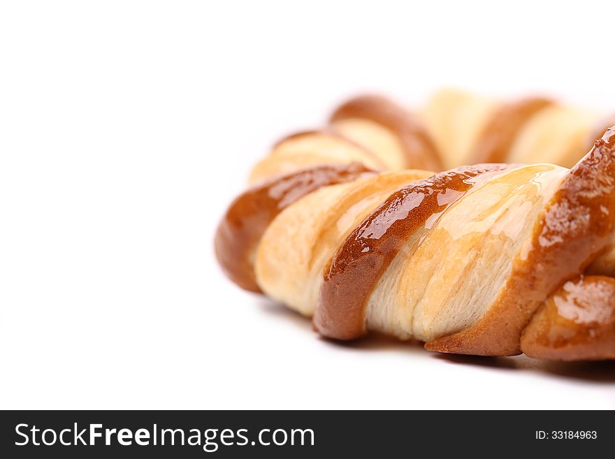 Freshly fancy pretzel baked. Close up. White background. Freshly fancy pretzel baked. Close up. White background.