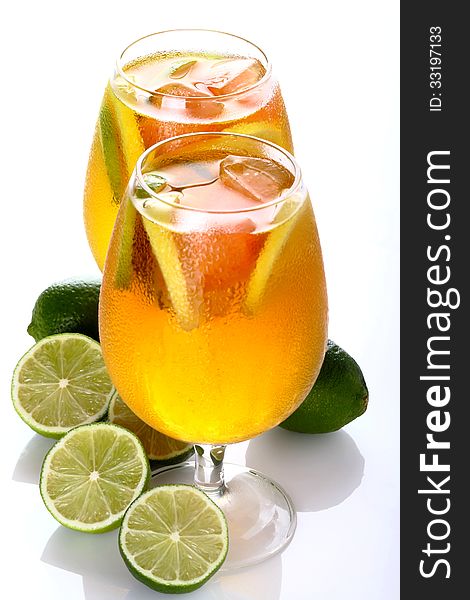 Lime with citrus cocktail glasses on a white background. Lime with citrus cocktail glasses on a white background