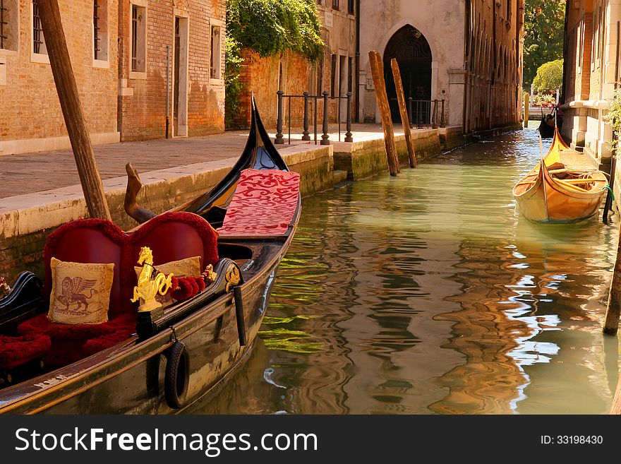 Boats on a canal in Venice, sunny morning. Boats on a canal in Venice, sunny morning