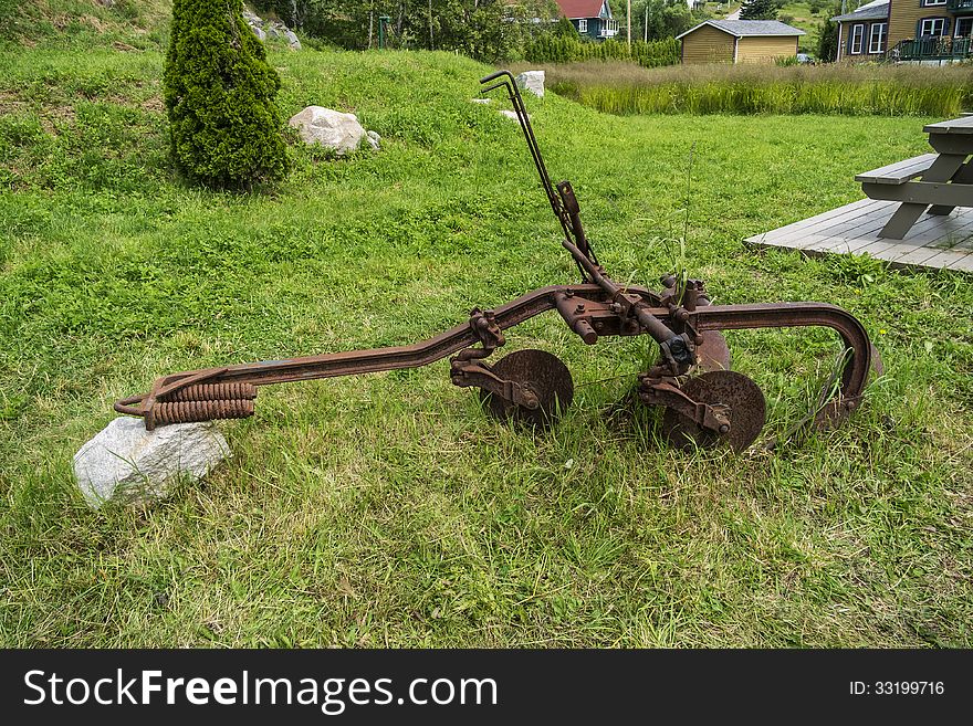 Vintage farm equipment in a provincial park. Vintage farm equipment in a provincial park