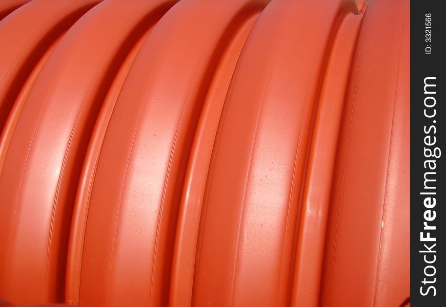 Orange pipes with shadow on sunny day. Orange pipes with shadow on sunny day