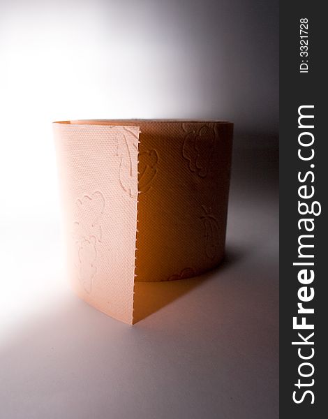 Orange toilet paper semi-isolated