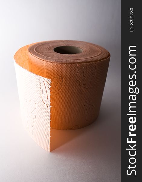 Orange toilet paper semi-isolated