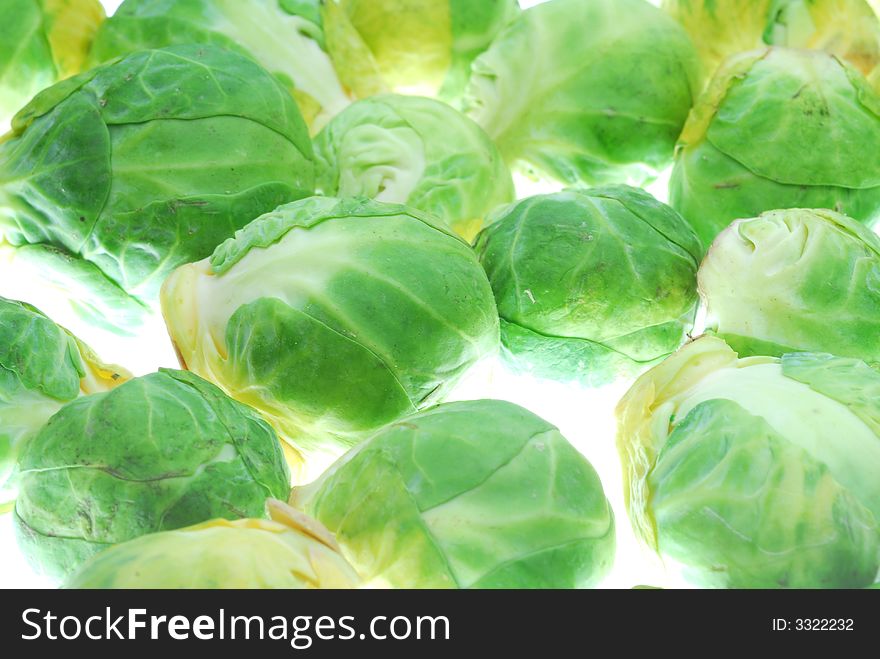 Green cabbages on white background