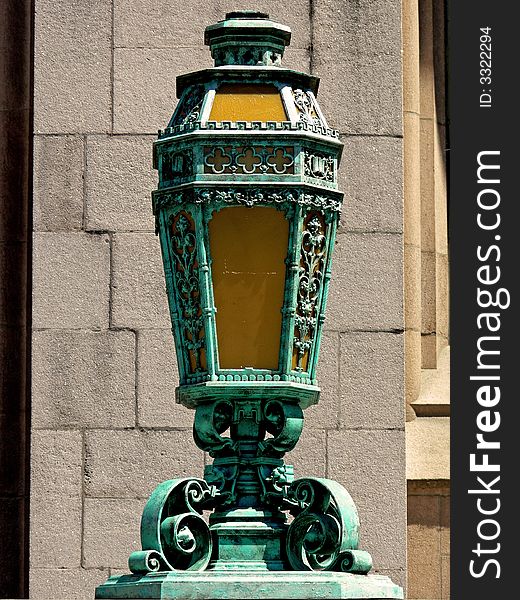 A shot of a classic style lantern out side of a building. A shot of a classic style lantern out side of a building.