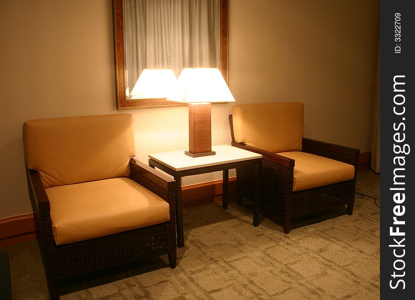 Table and 2 chairs with a lamp and mirror. Table and 2 chairs with a lamp and mirror