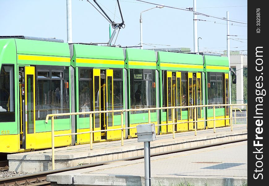 New tram in poznan in poland, blue sky