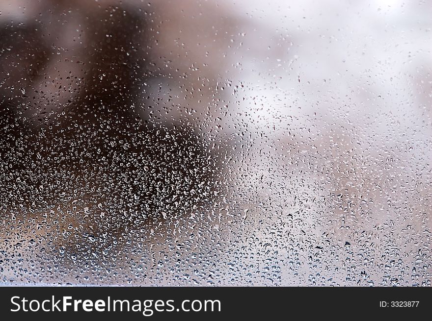 Raindrops on a window - autumn is here