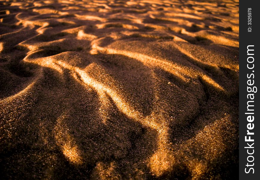 This is a photograph of an incredible formation of sand on a beach in southern France during sunset. This is a photograph of an incredible formation of sand on a beach in southern France during sunset.