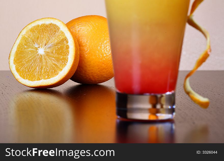 Fresh orange juice on the black table