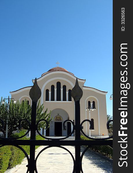 A big orthodox church behind the iron gate. A big orthodox church behind the iron gate