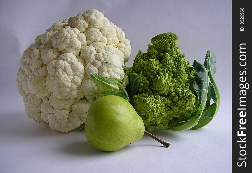 Autumn still-life from apples of pears and cabbage. Autumn still-life from apples of pears and cabbage