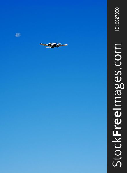 The moon and a plane