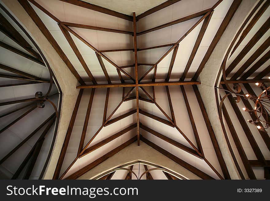 Ceiling of a chapel, chandelier also visible. Ceiling of a chapel, chandelier also visible