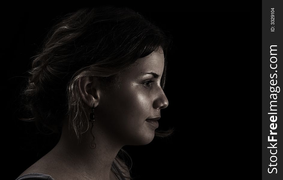Portrait of Woman profile on dark background. Portrait of Woman profile on dark background