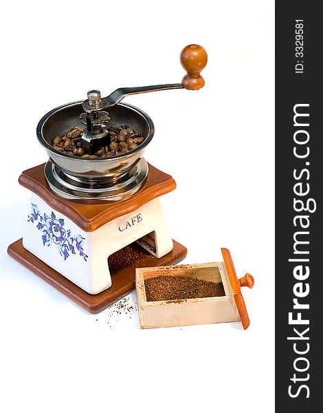 Coffee-grinder at white background