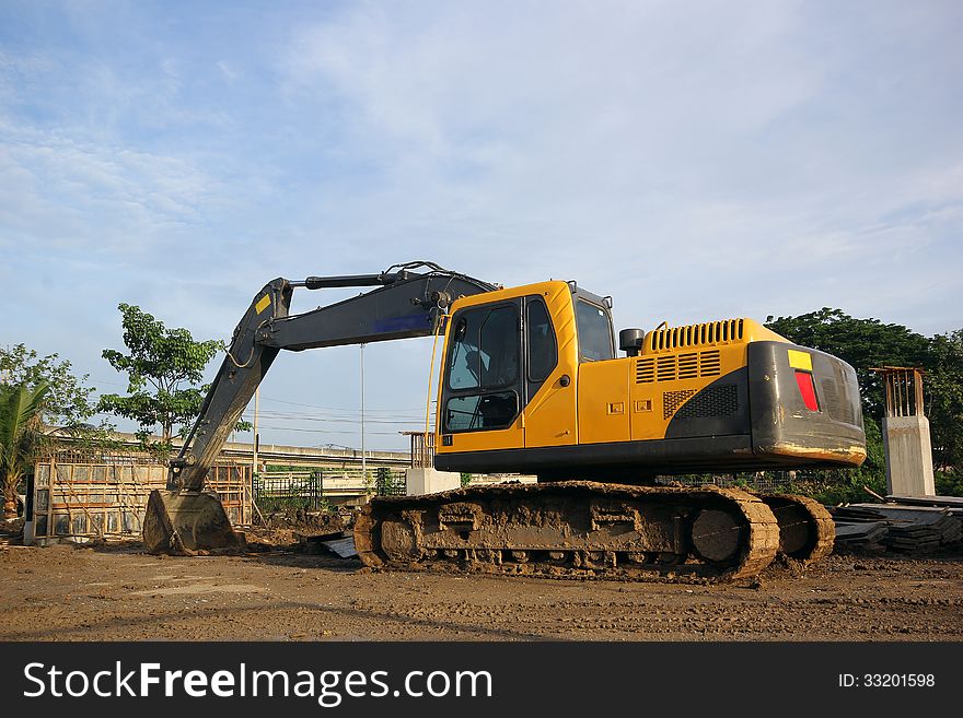 Excavator and backhoe on construction site