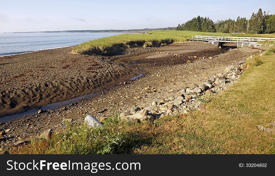 The long sandy beach in Herring Cove Provincial Park is situated on Campobello Island in the Bay of Fundy. The island - accessible from Lubec, Maine via the FDR International Bridge - is part of the province of New Brunswick. The provincial park shares a border with the Roosevelt Campobello International Park, where the Roosevelt family once vacationed. The long sandy beach in Herring Cove Provincial Park is situated on Campobello Island in the Bay of Fundy. The island - accessible from Lubec, Maine via the FDR International Bridge - is part of the province of New Brunswick. The provincial park shares a border with the Roosevelt Campobello International Park, where the Roosevelt family once vacationed.