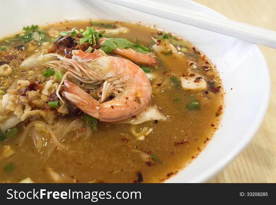 Tom Yam Koong soup with noodles