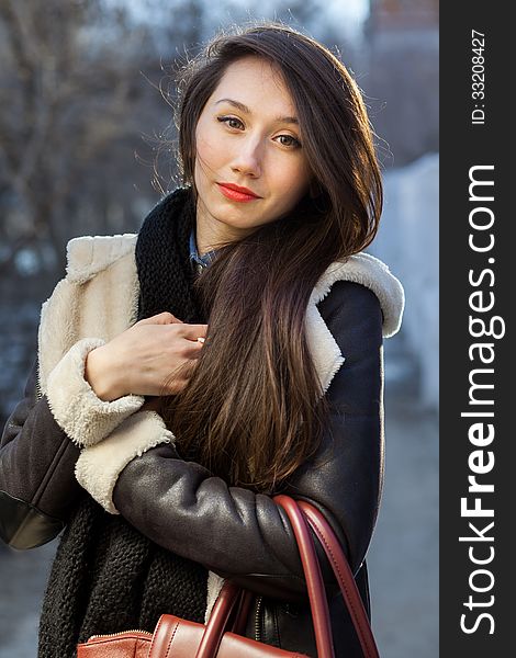 A young cute woman outdoor photo shot