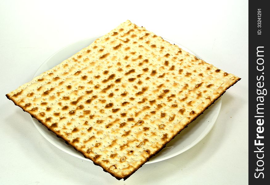 Matzoh on a plate - jewish passover bread. Matzoh on a plate - jewish passover bread