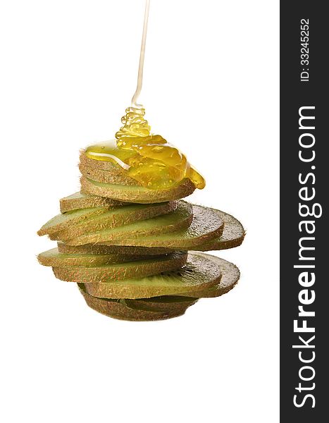 Slices of kiwi on white background