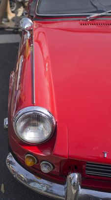 Headlight On A Car Hood Royalty Free Stock Image