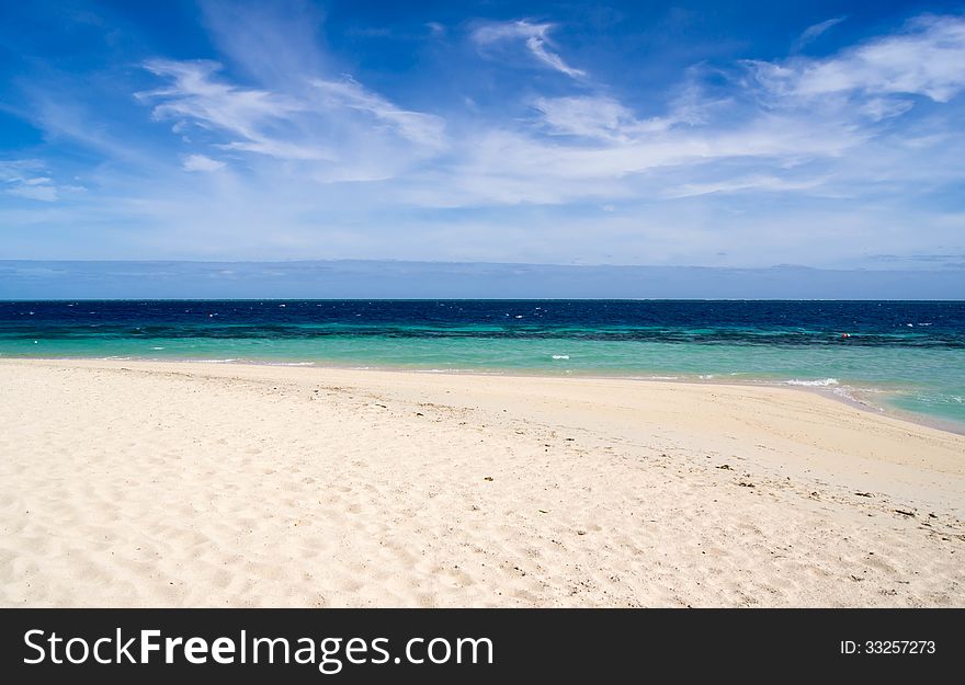 Beach and sky and ocean in windy day