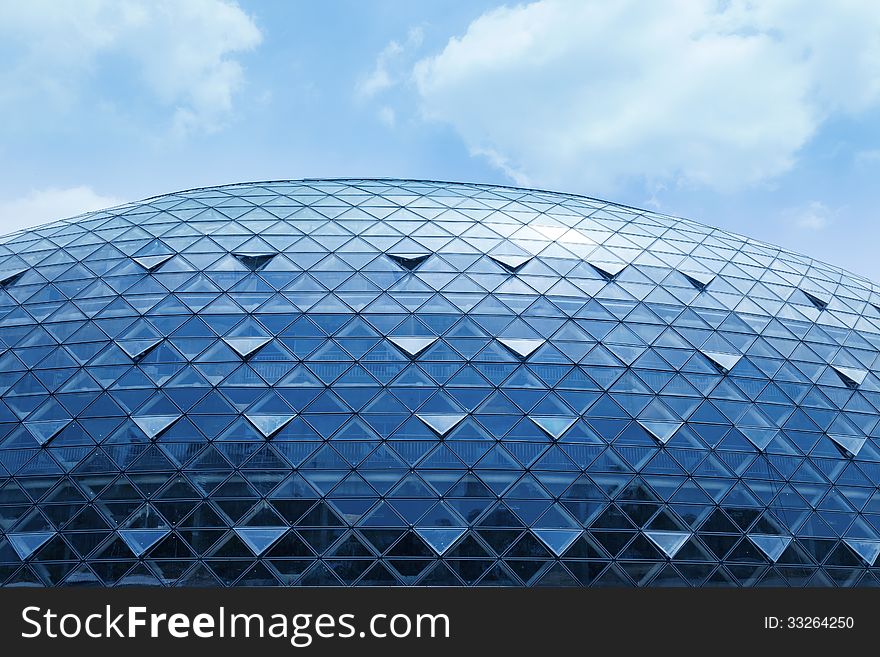 Modern hemispheric building with exterior glass walls. Modern hemispheric building with exterior glass walls