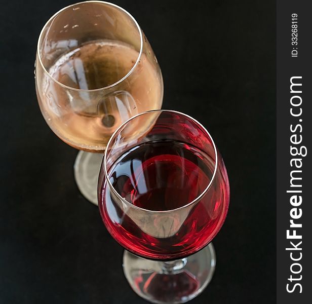 Wineglasses with red and white wine