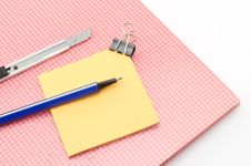 Red Notebook With Post It And Bulldog Clip Blue Pen Cutter Isola Stock Images