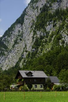 House Under The Alps Cliff Stock Photography