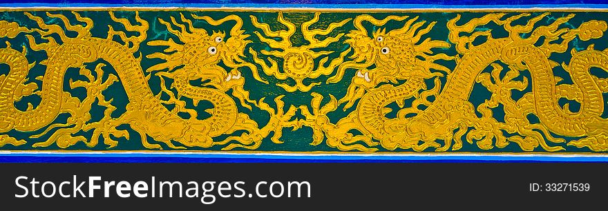 Couple of golden dragons paiting in chinese temple