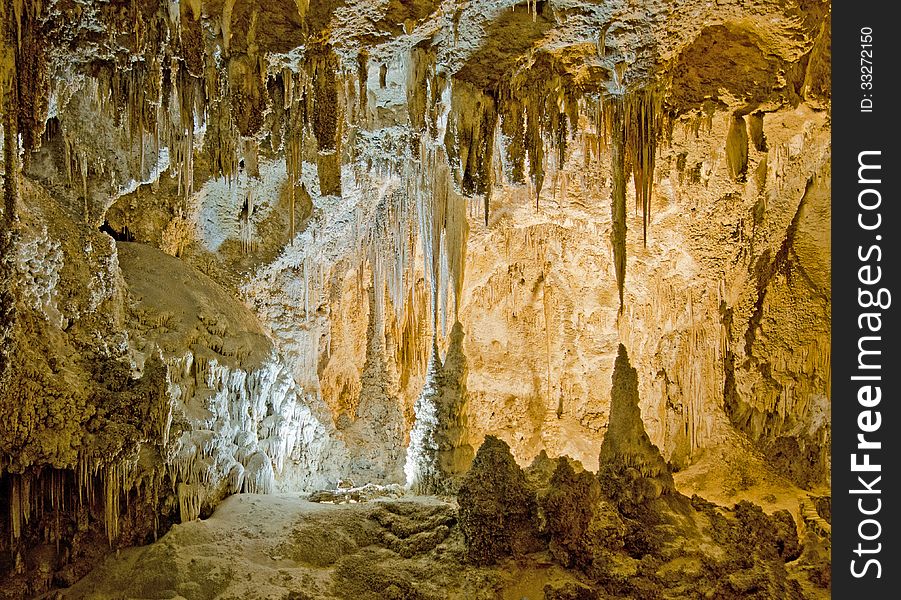 A grotto in Carlsbad Caverns National Park, New Mexico. The caves formed from sulfuric acid disovling limestone. The park is located in the Guadalupe Mountains at the northern end of the Chihuahua Desert that extends up from Mexico. A grotto in Carlsbad Caverns National Park, New Mexico. The caves formed from sulfuric acid disovling limestone. The park is located in the Guadalupe Mountains at the northern end of the Chihuahua Desert that extends up from Mexico.