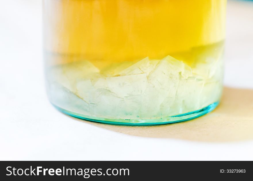 Sugar crystallization in a syrup bottle. Sugar crystallization in a syrup bottle