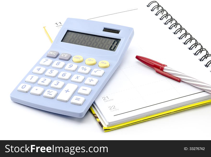 Calculator  With Notebook And Red Pen Isolated On White