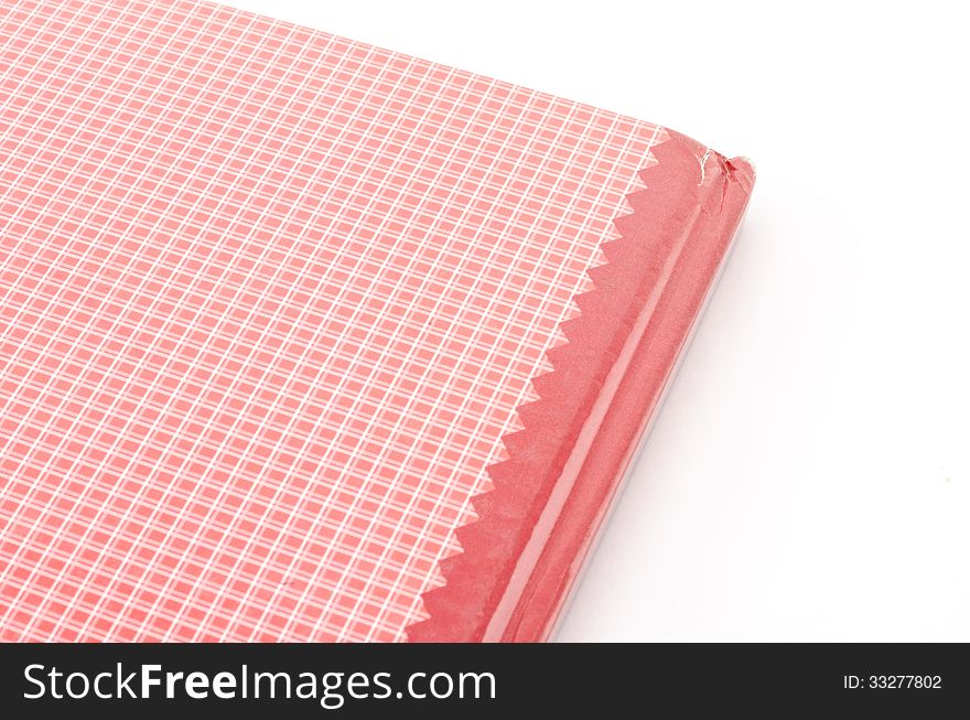 Red notebook isolated on white background