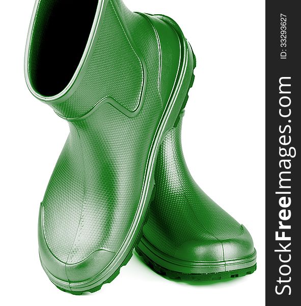 Pair of Comfortable Green Rubber Boots isolated on white background