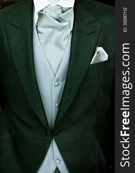 Close up photo of groom's wedding suit. Close up photo of groom's wedding suit