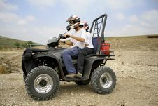 Men Riding On A Quad Stock Images