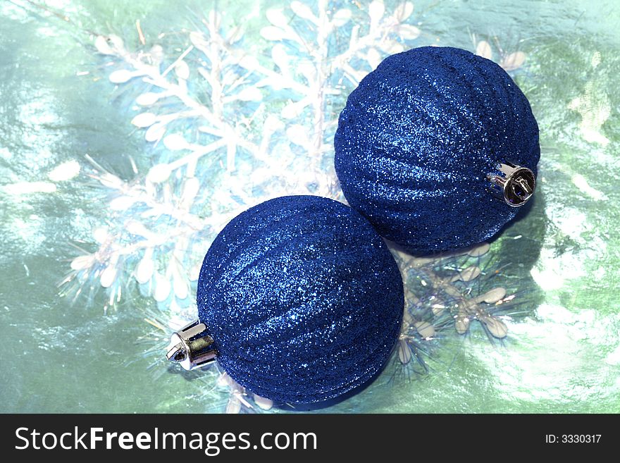 Blue Christmas balls on background